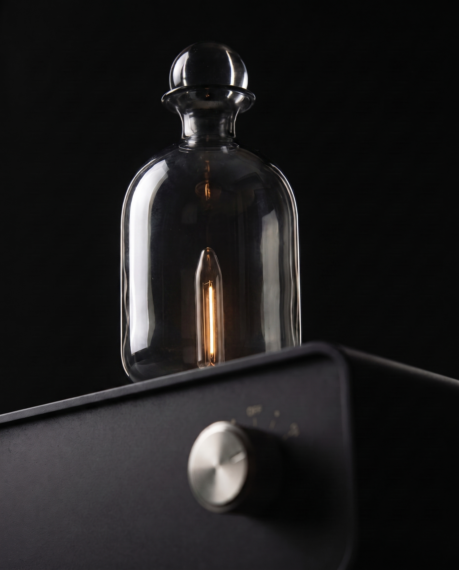 The Still smoked glass vessel detail